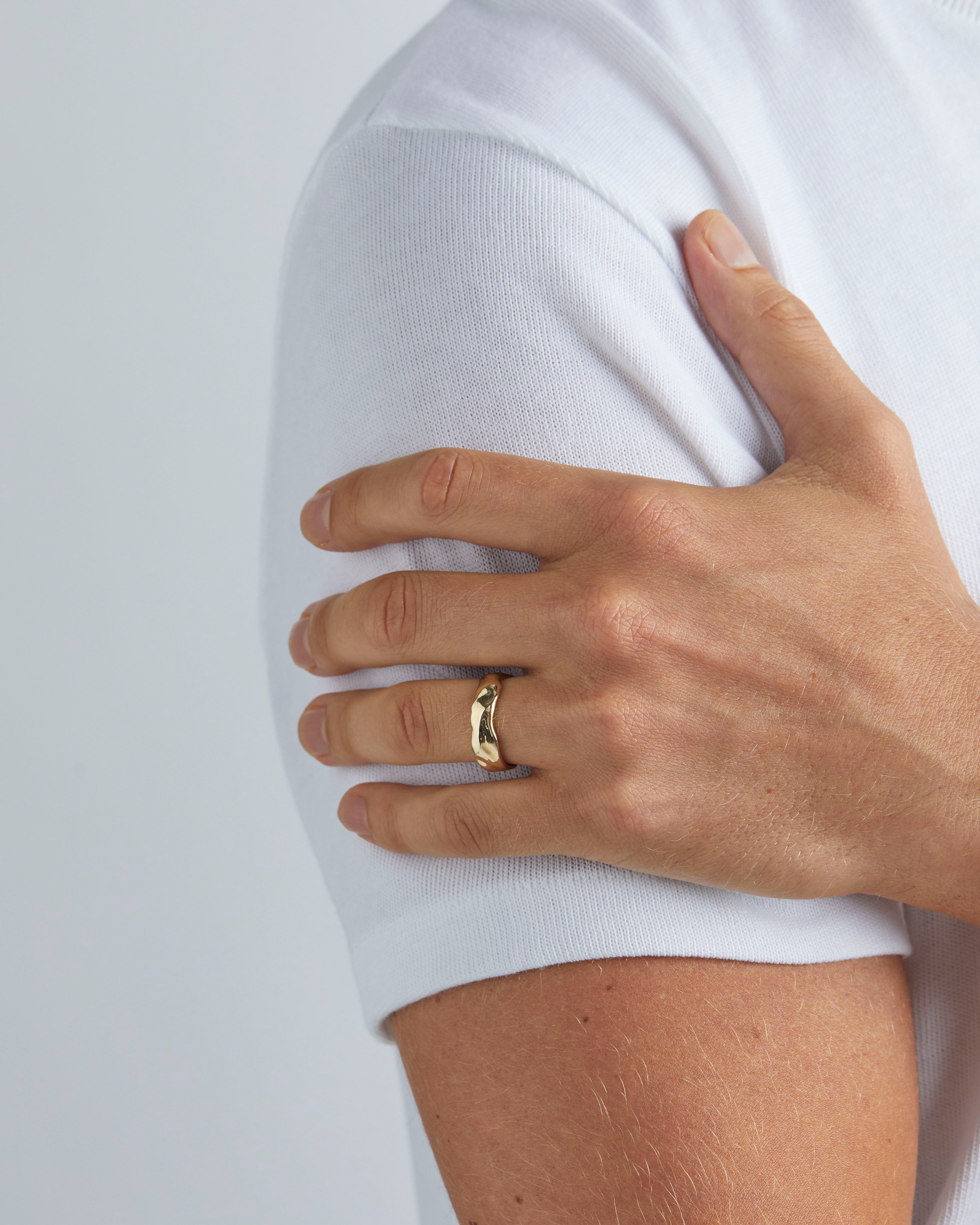 Male wearing the Organic Wedding Ring | 6mm in Yellow Gold.