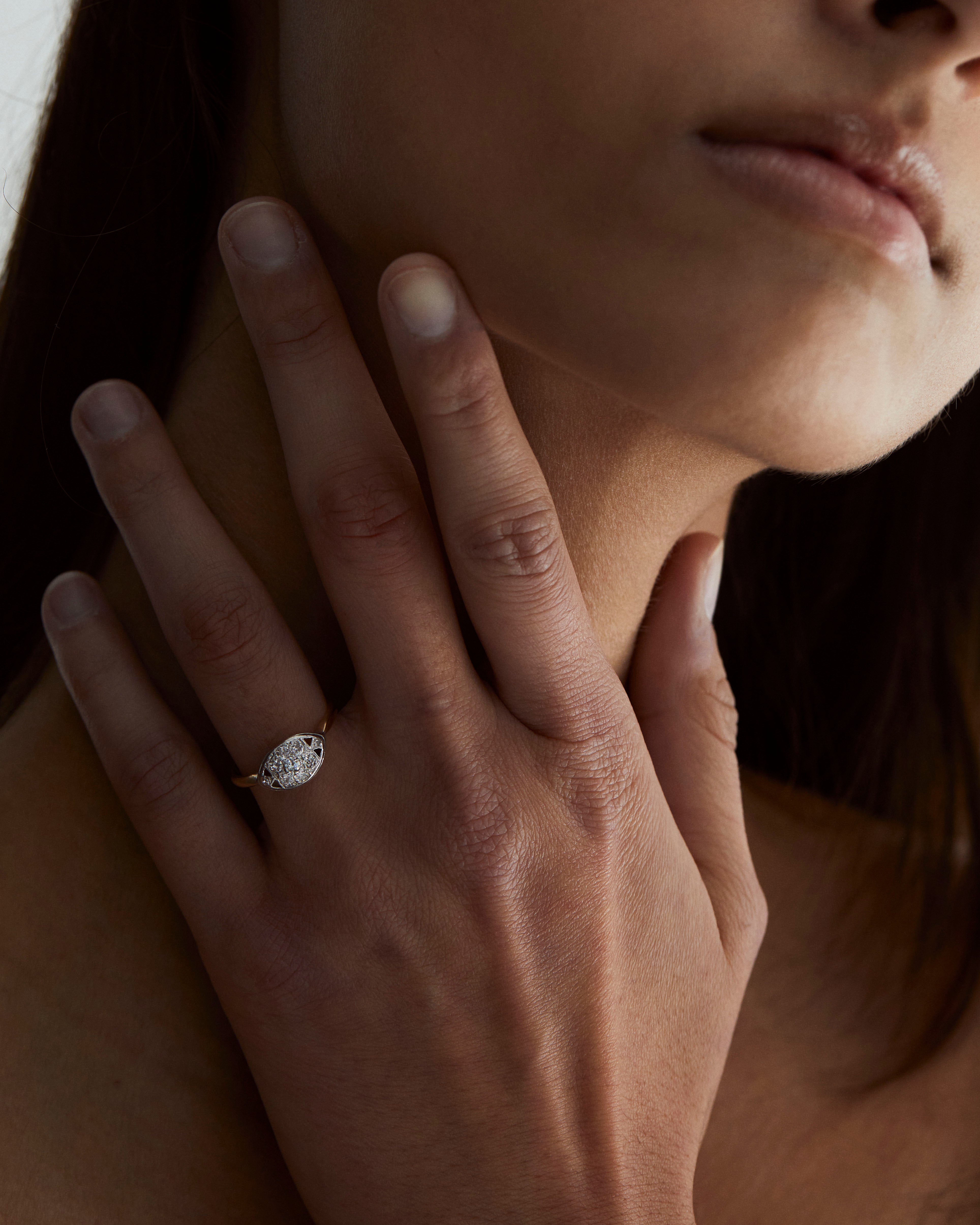A woman wearing the Selene Vintage Ring | Diamonds.