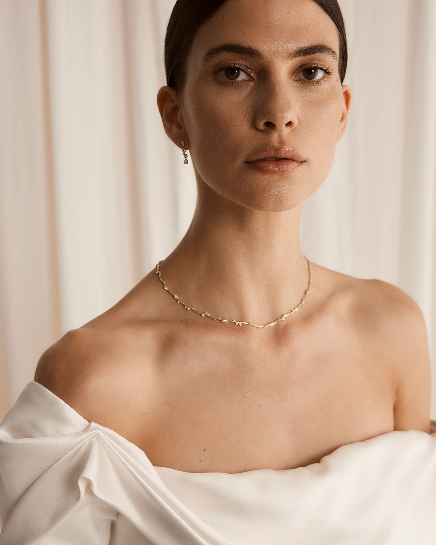 Model wearing a white wedding dress with the Ember Diamond Necklace