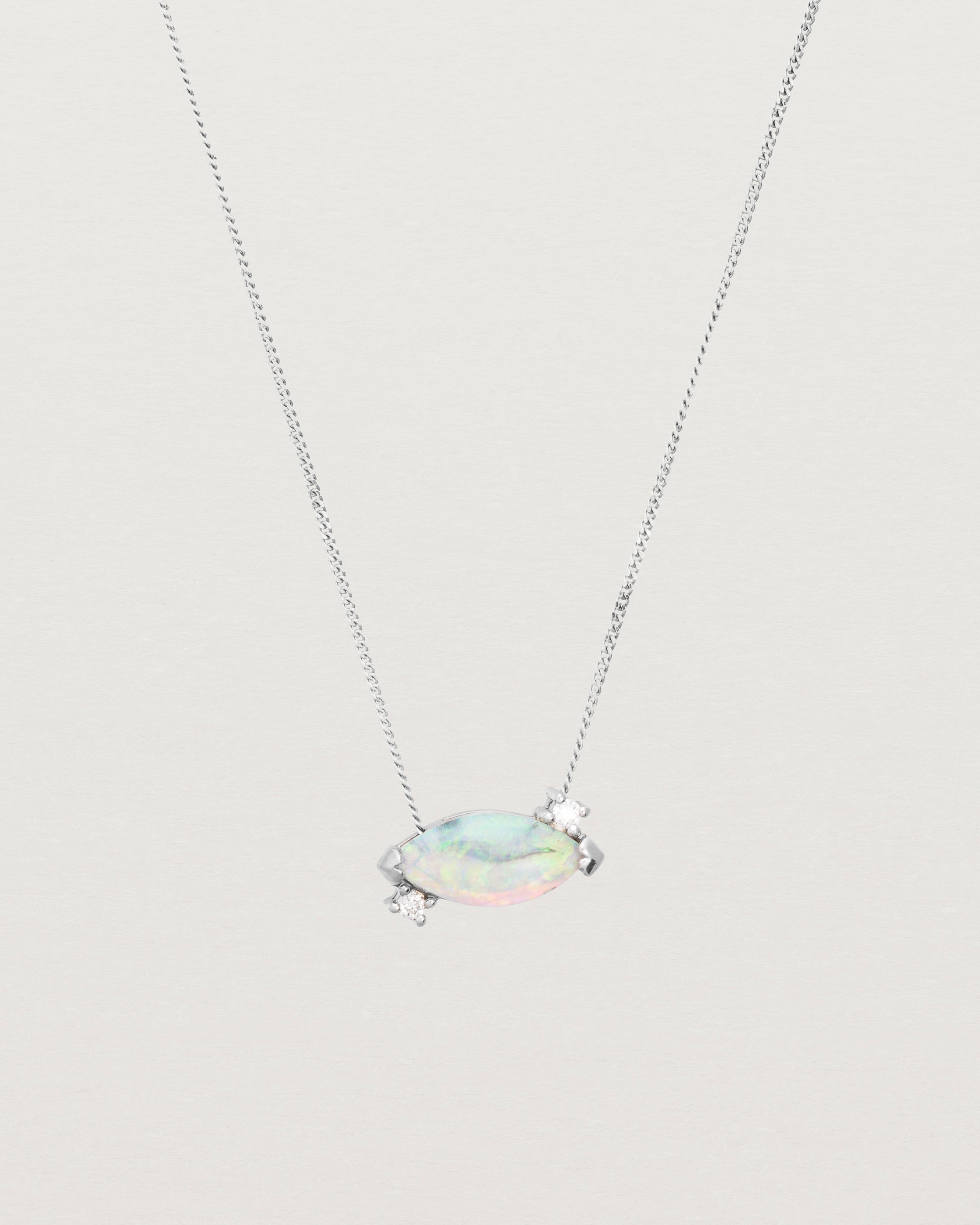 White Gold blue opal necklace with two small white diamonds