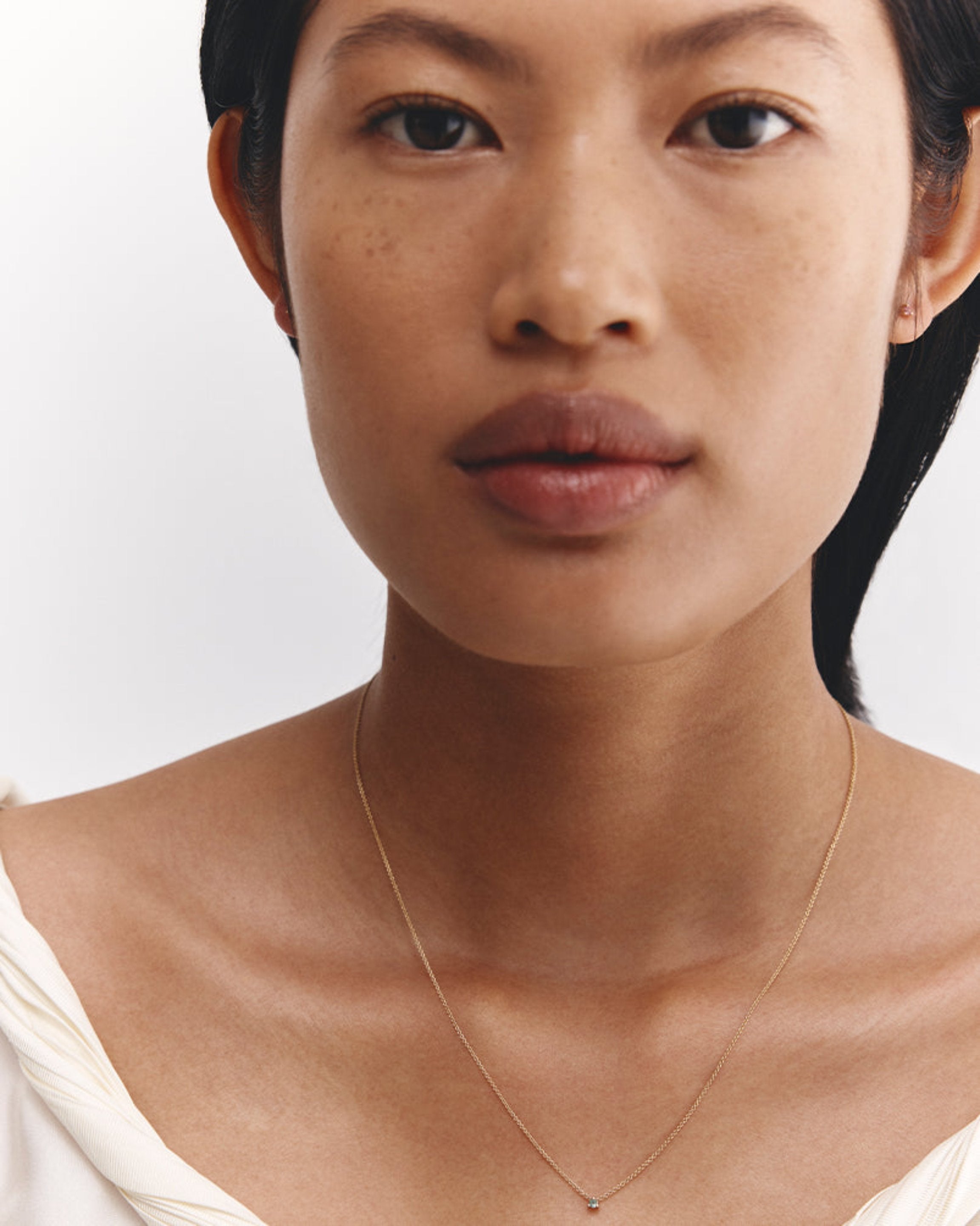 Model wears Aiona Slider necklace with Ceylon Sapphire.