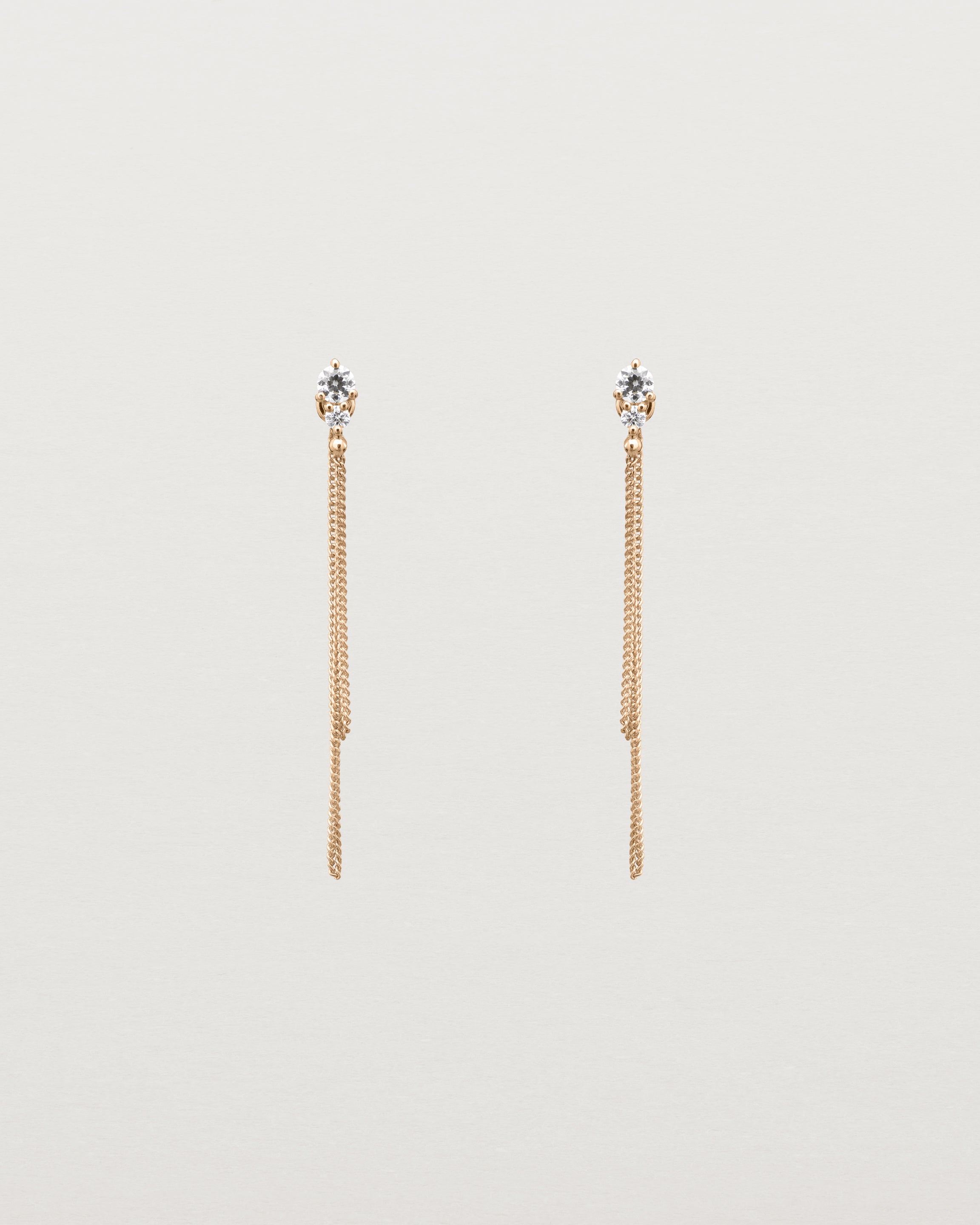 Front view of the Aiona Loop Studs | Diamonds in rose gold.