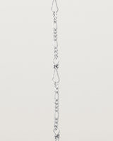 A close up of the Anam Charm Bracelet in sterling silver.
