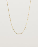 The Anam Charm Necklace in yellow gold.