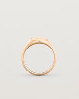 Standing view of the Arden Signet Ring | Millgrain in rose gold.