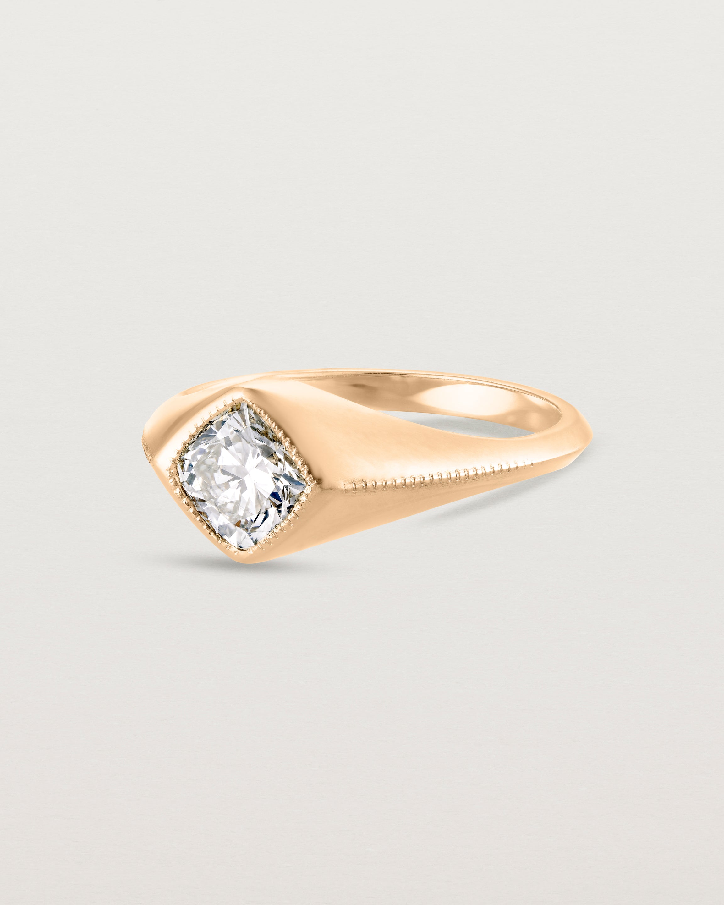 Angled view of the Átlas Cushion Signet | Laboratory Grown Diamond in rose gold.