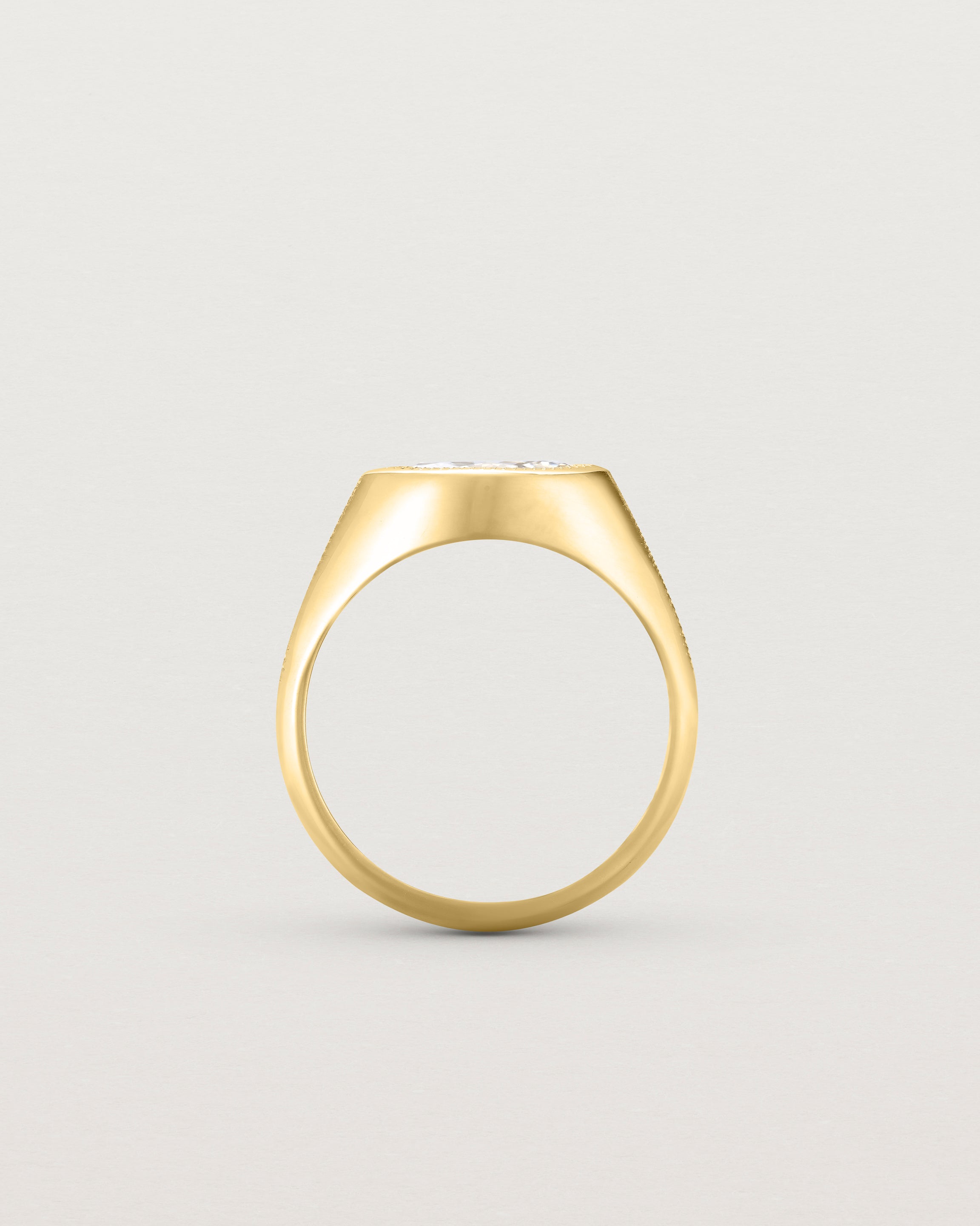 Standing view of the Átlas Marquise Signet | Laboratory Grown Diamond in yellow gold, in a polished finish.