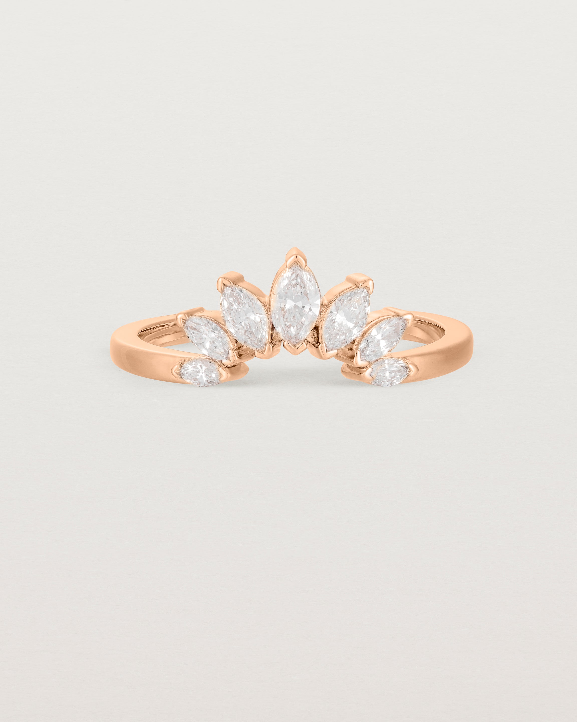 A white diamond, sun-beam inspired crown ring crafted in rose gold