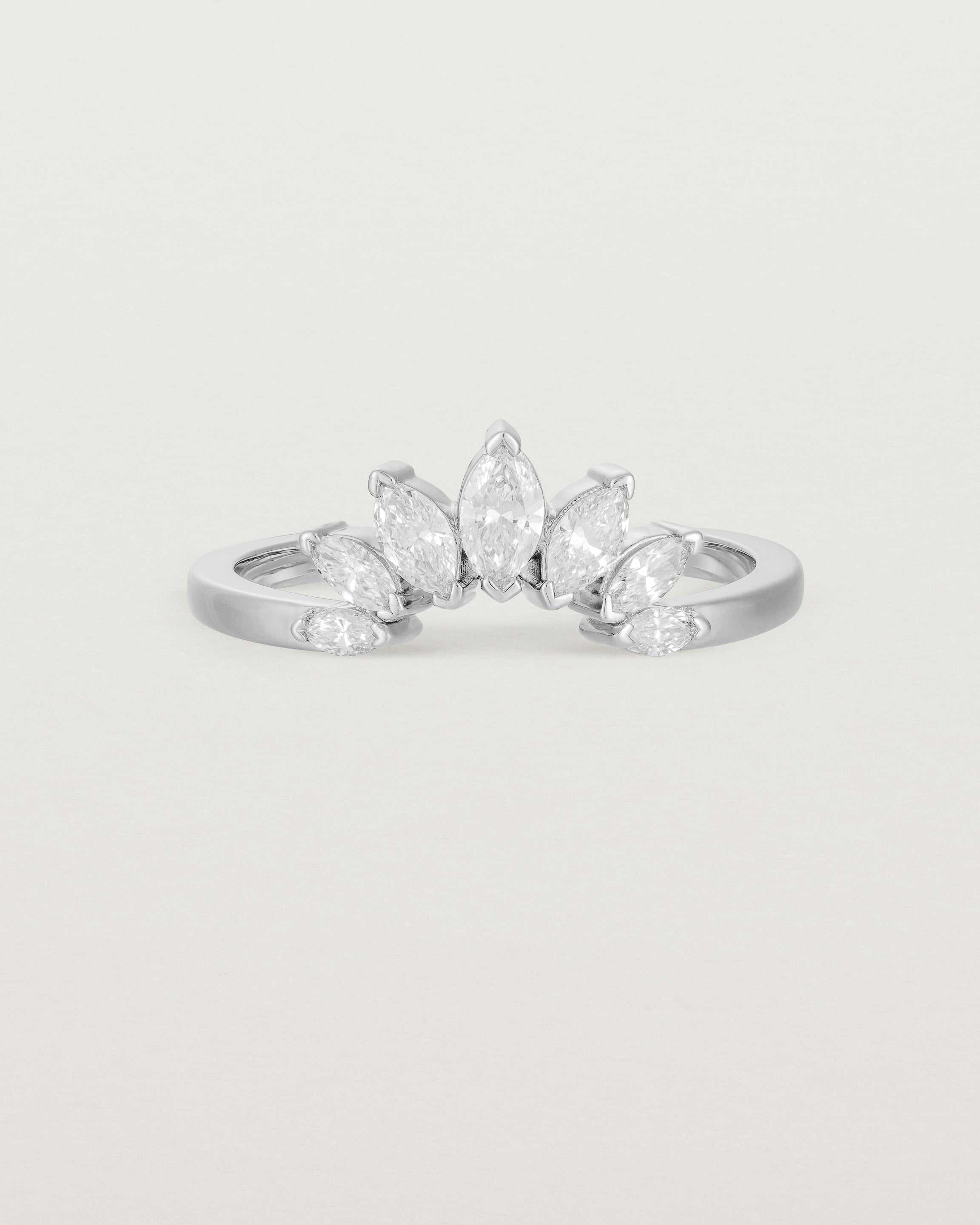 A white diamond, sun-beam inspired crown ring crafted in white gold