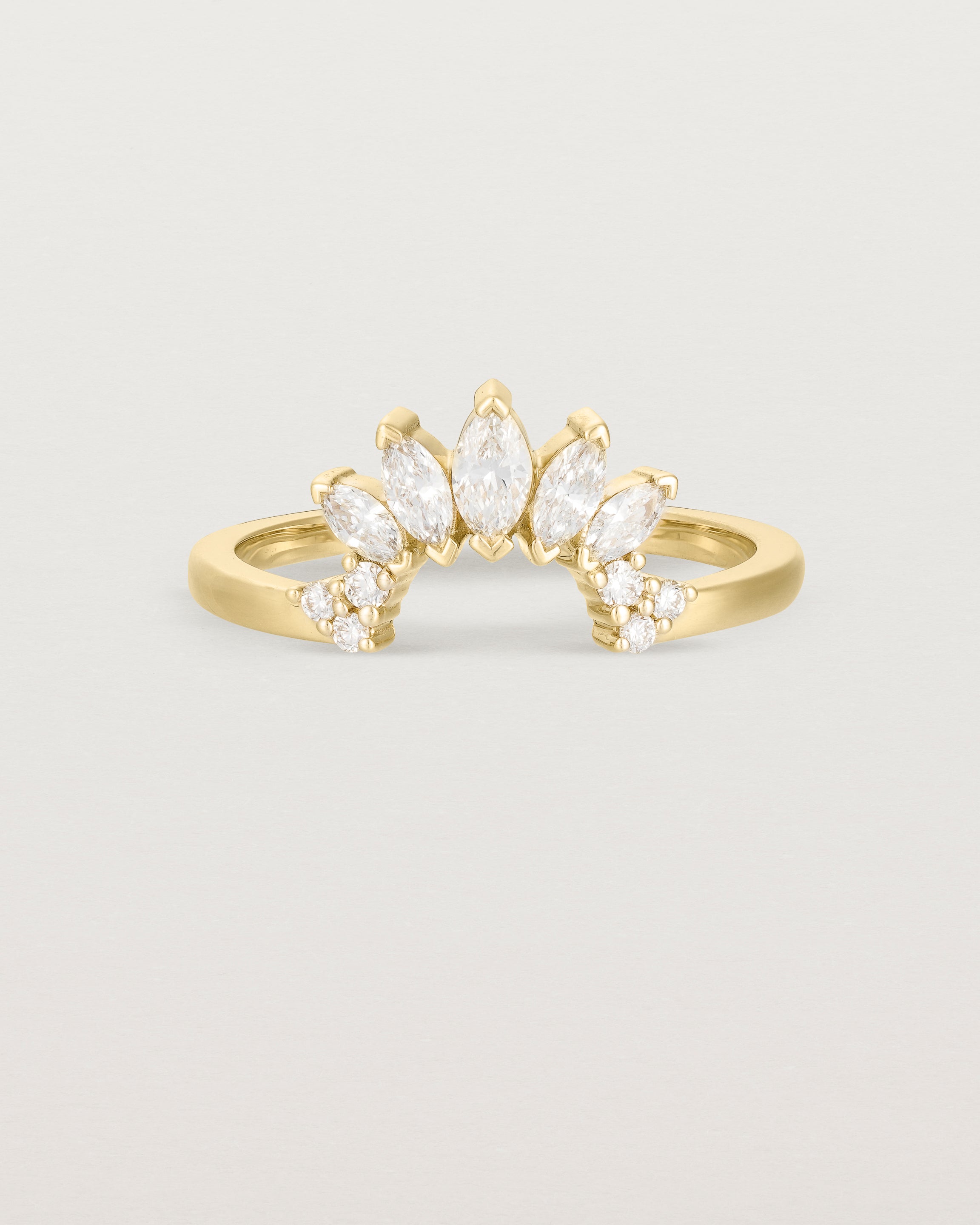 Fit two of a white diamond, sun-beam inspired crown ring crafted in yellow gold