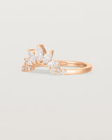 Fit three of a white diamond, sun-beam inspired crown ring crafted in rose gold