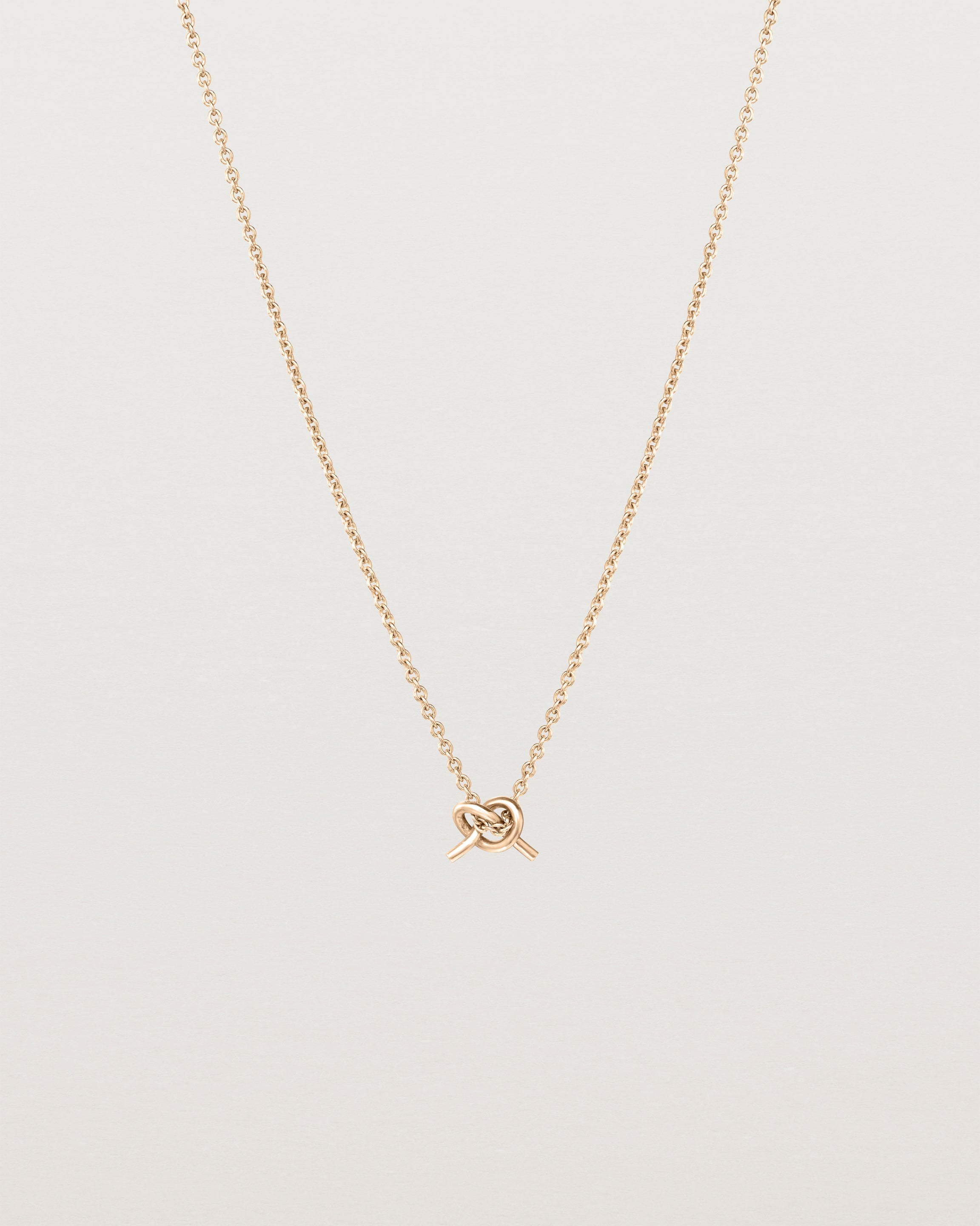 Front view of the Cara Necklace in rose gold.