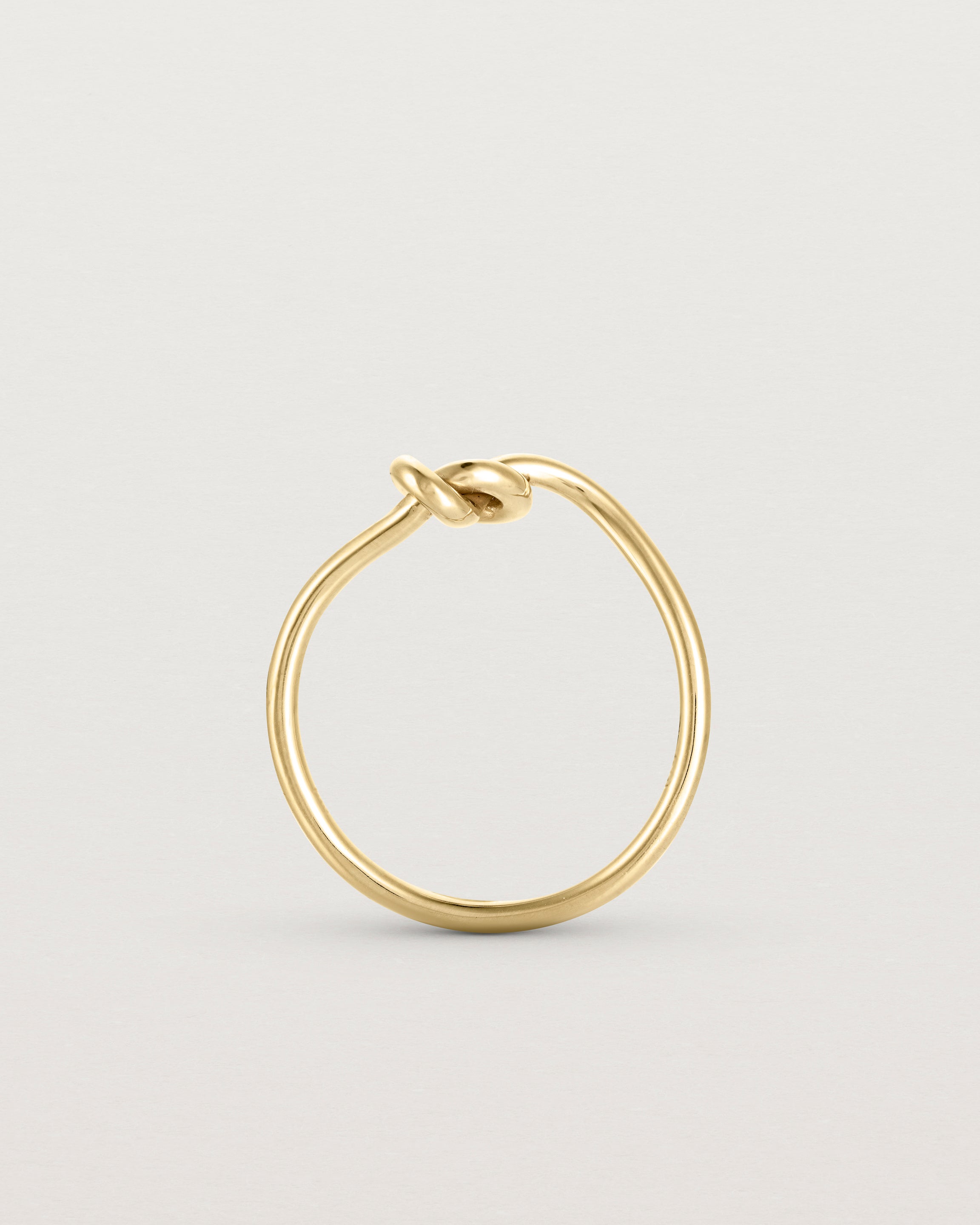 Standing view of the Cara Ring in yellow gold.