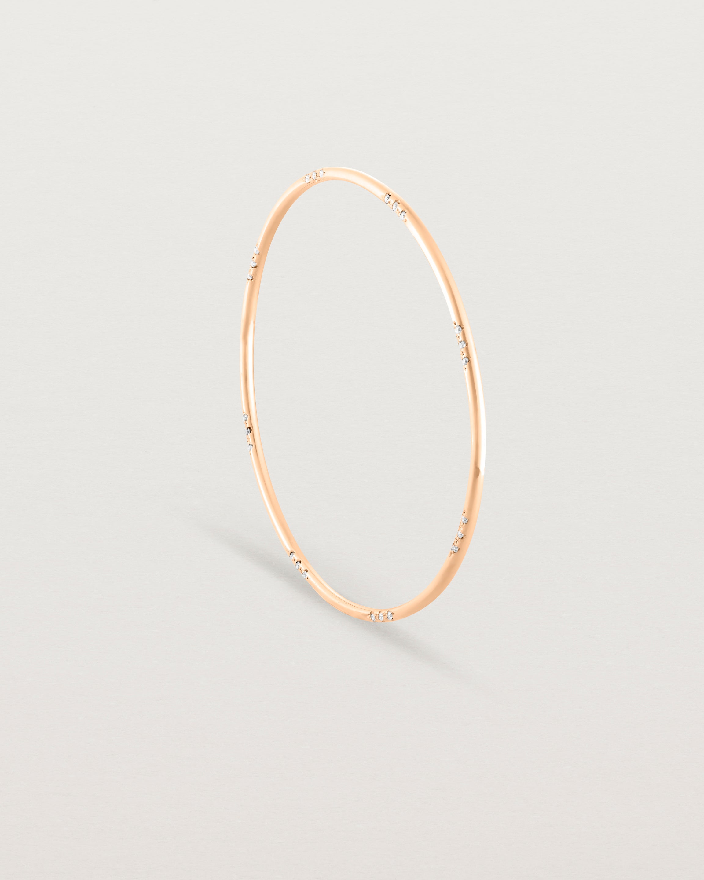 Standing view of the Cascade Oval Bangle | Diamonds | Rose Gold