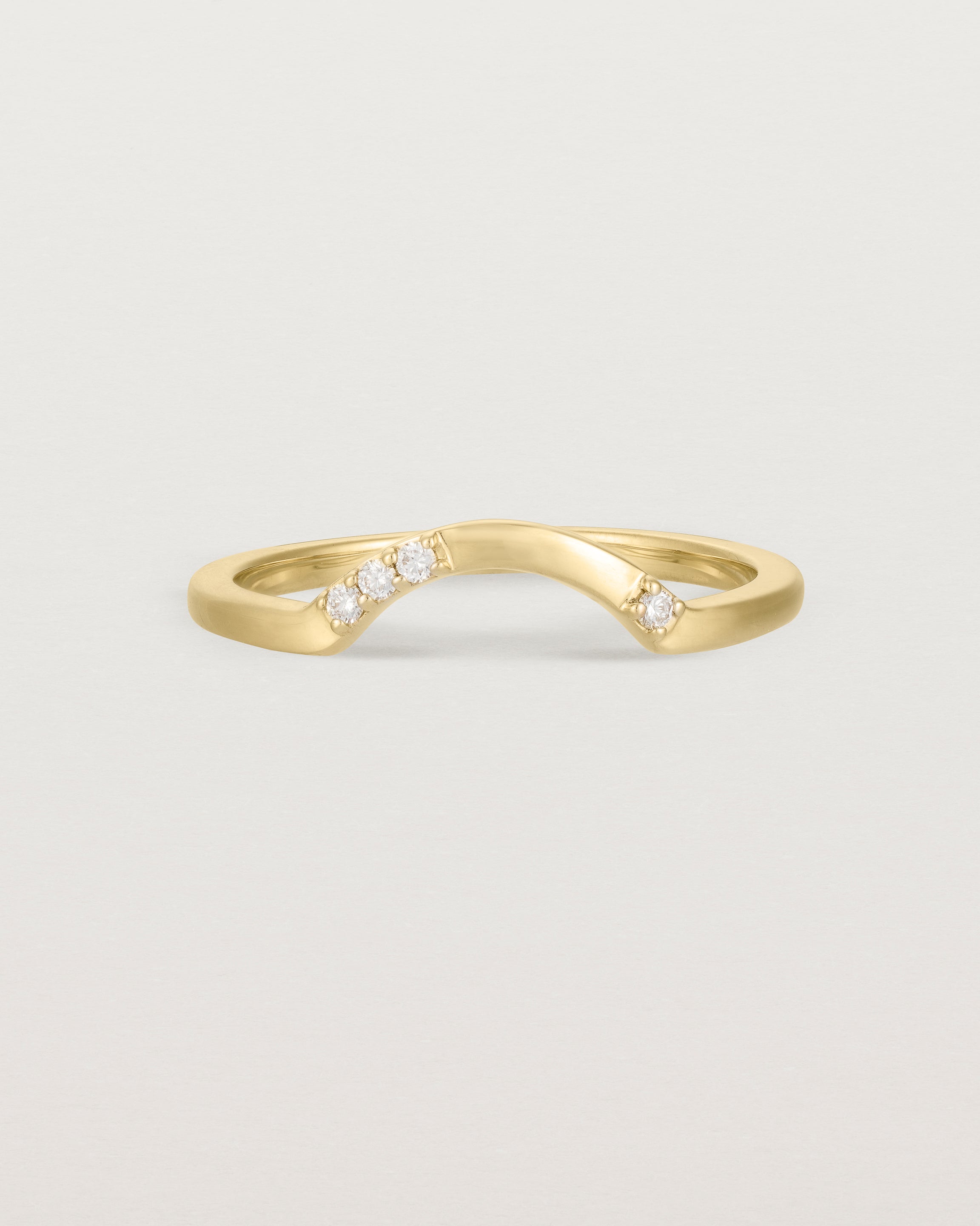 Fit three of a classic arc crown ring featuring scattered white diamonds, crafted in yellow gold
