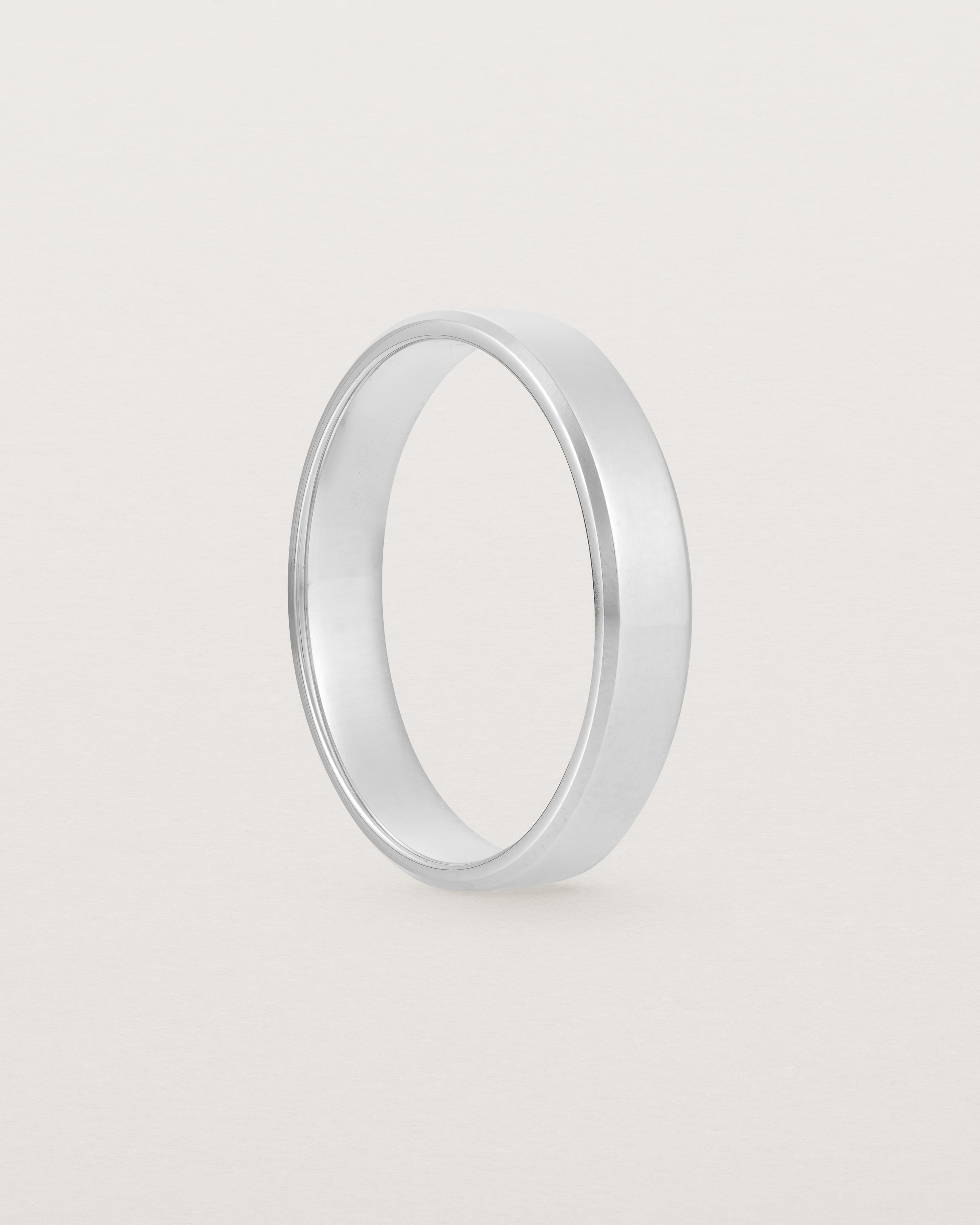 4mm white gold wedding band with a chamfered edge