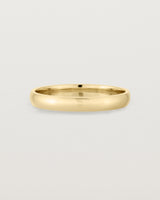 A 3mm fine, classic wedding band in yellow gold
