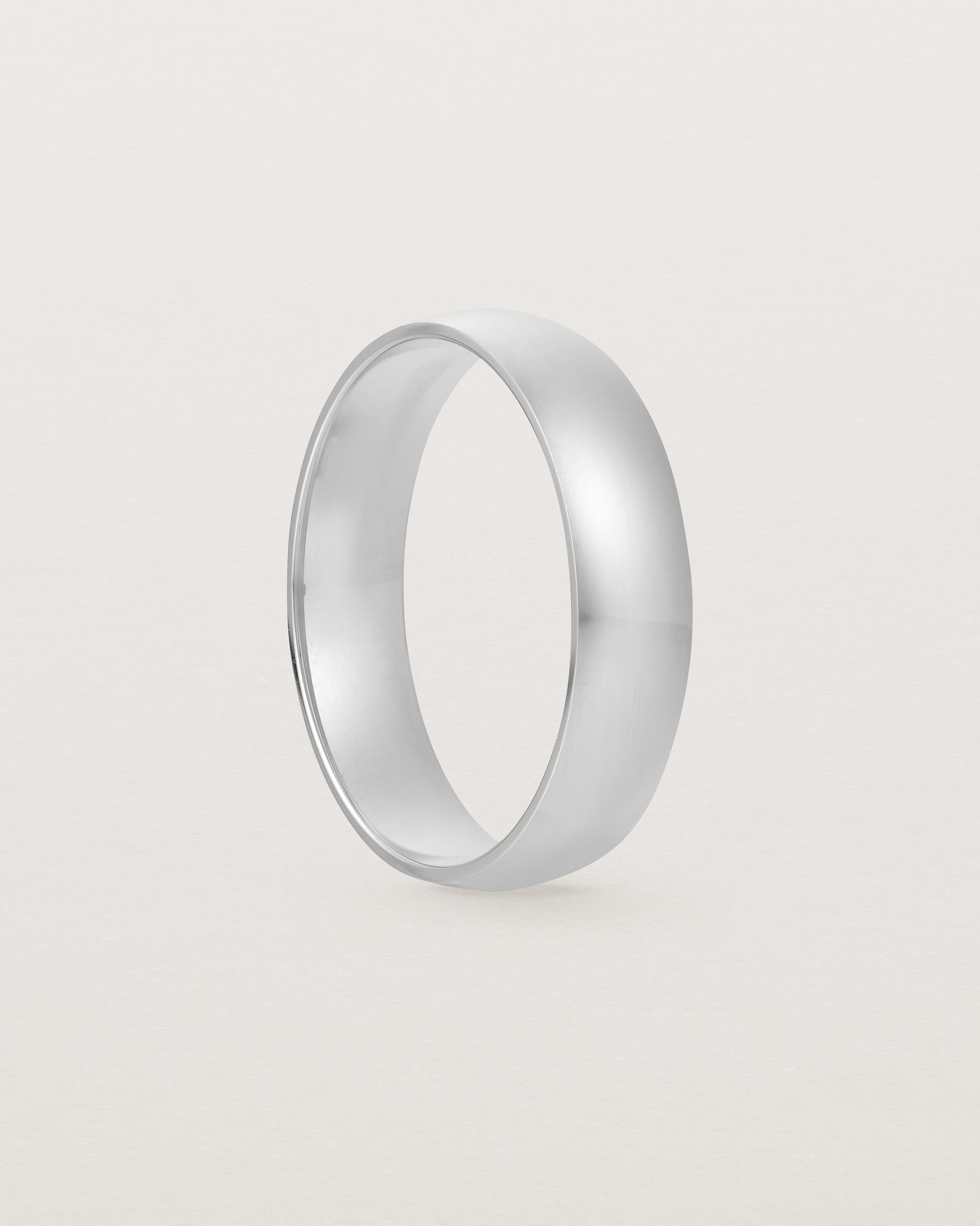A classic 5mm wedding band, our most popular width, crafted in sterling silver