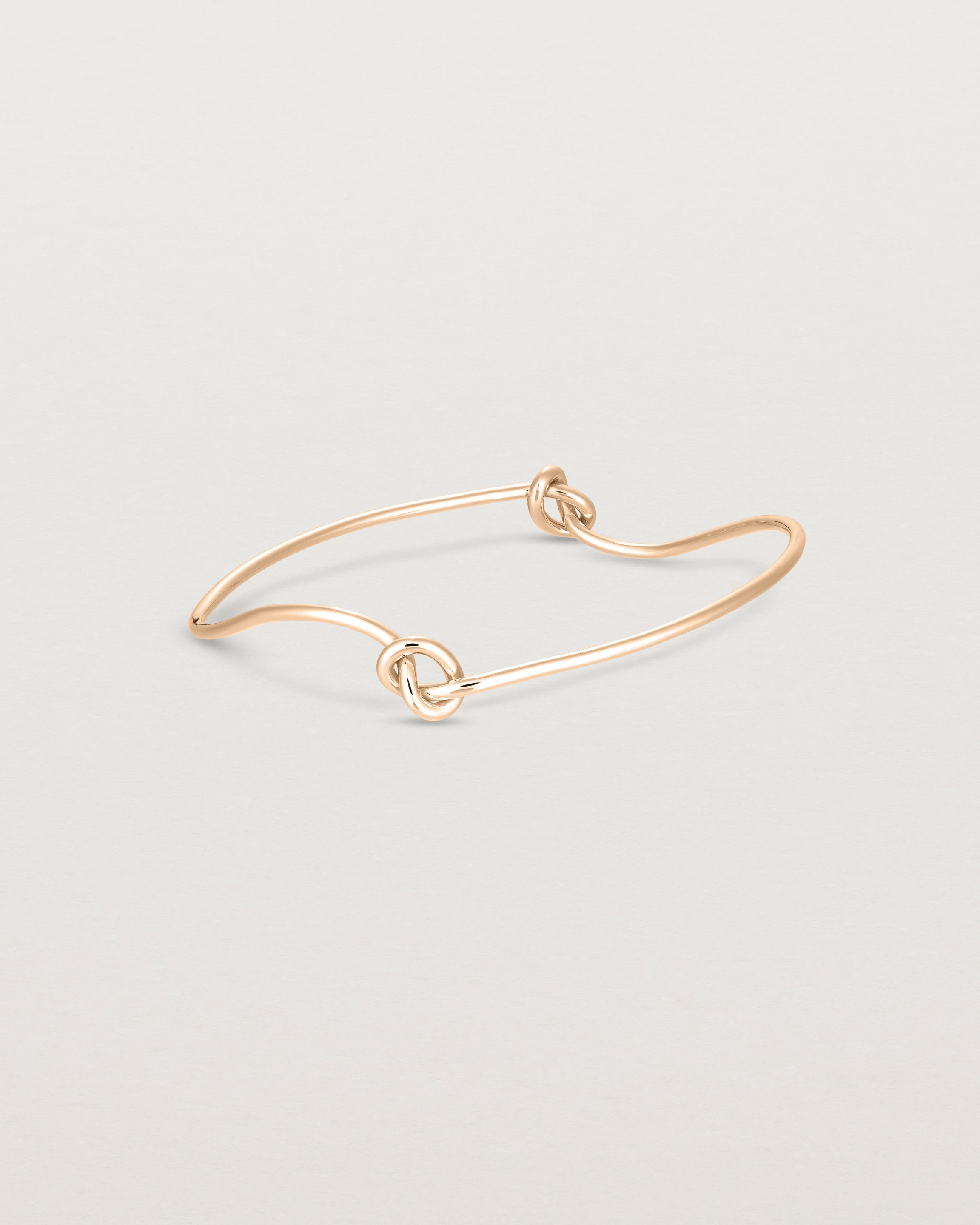 Front view of the Dà anam Bangle in rose gold.