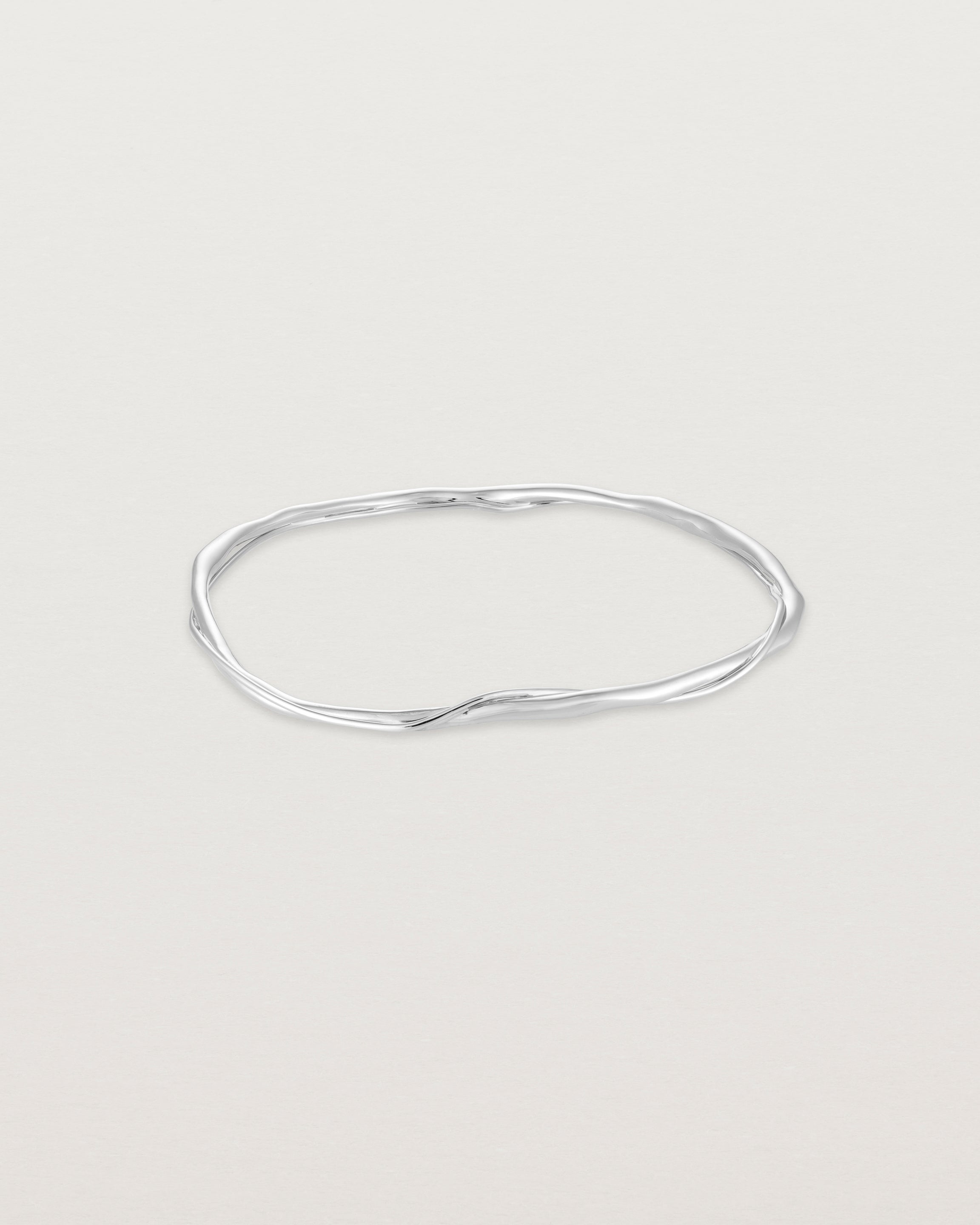 Front view of the Dalí Bangle in sterling silver.