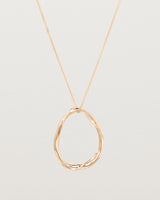 Front view of the Dalí Necklace in rose gold.