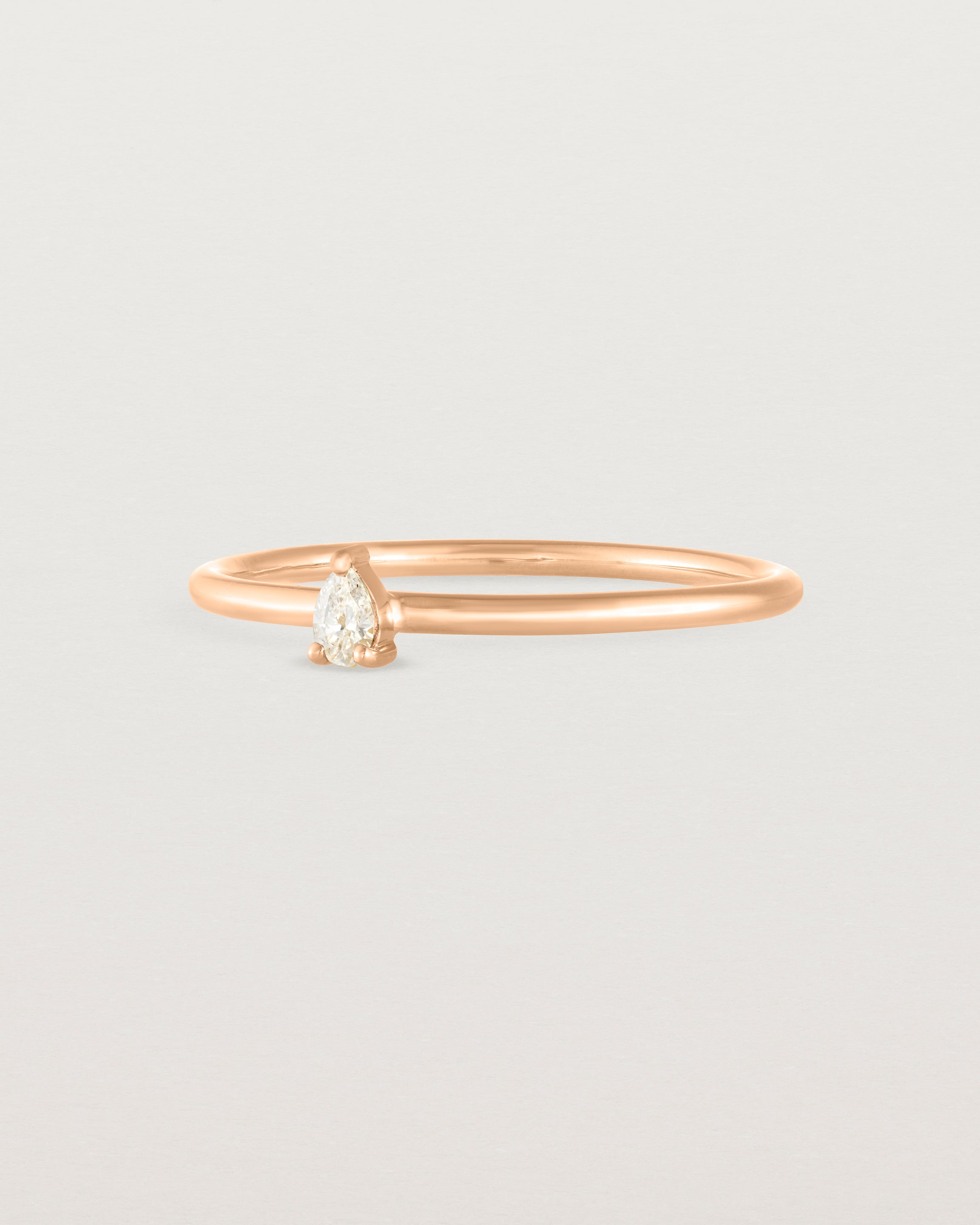 Angled view of the Danaë Stacking Ring | Diamond in rose gold.