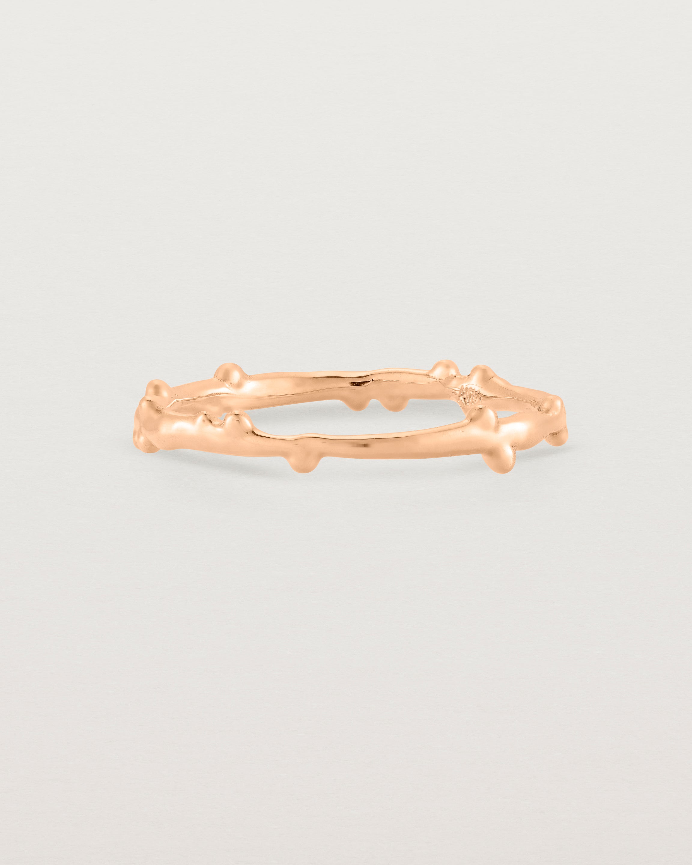 Front view of the Dotted Organic Stacking Ring in Rose Gold.