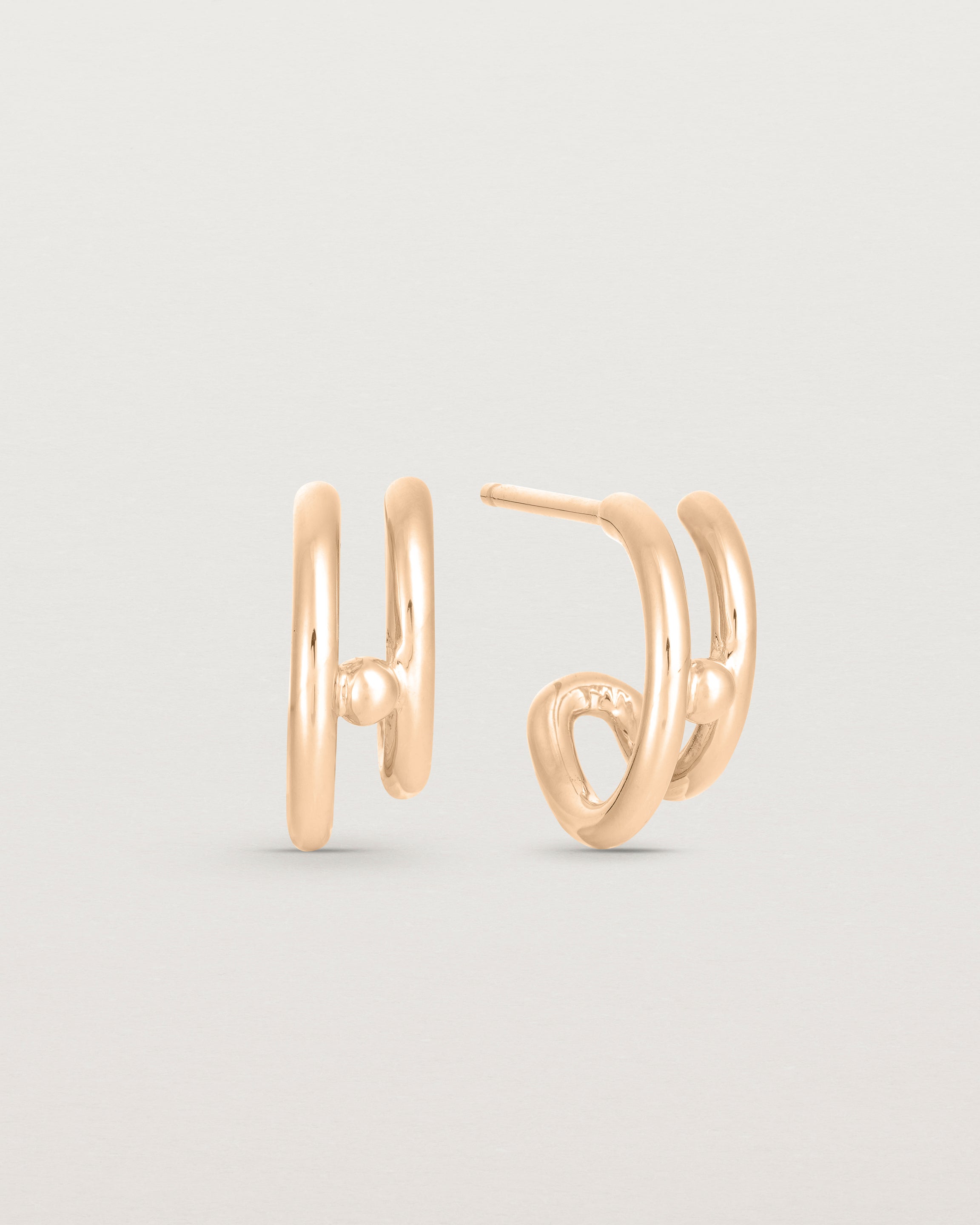A pair of Double Reliquum Hoops in rose gold.