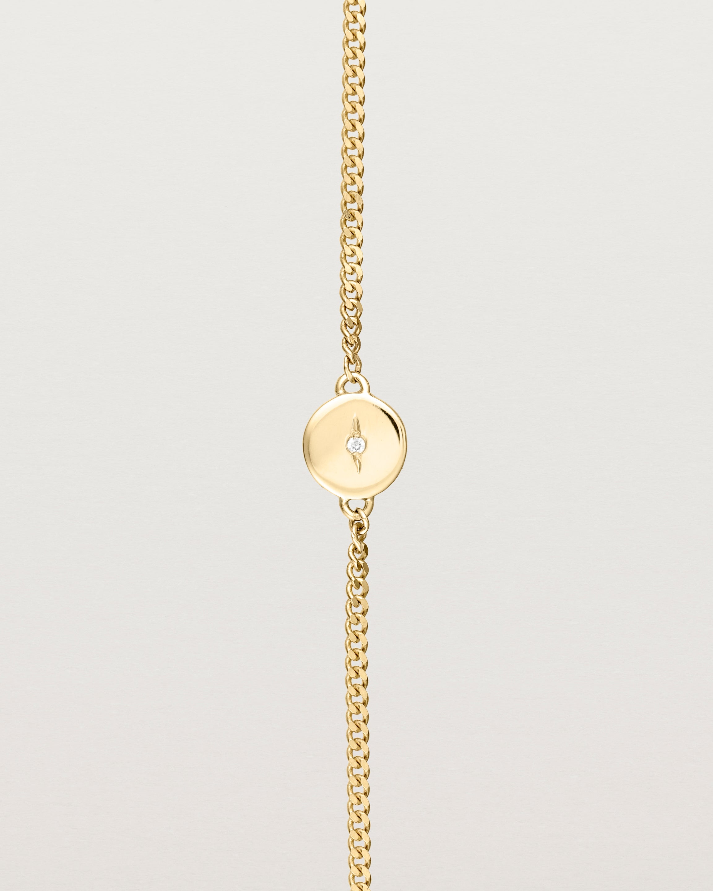 Close up of the Eily Bracelet | Birthstone in yellow gold.