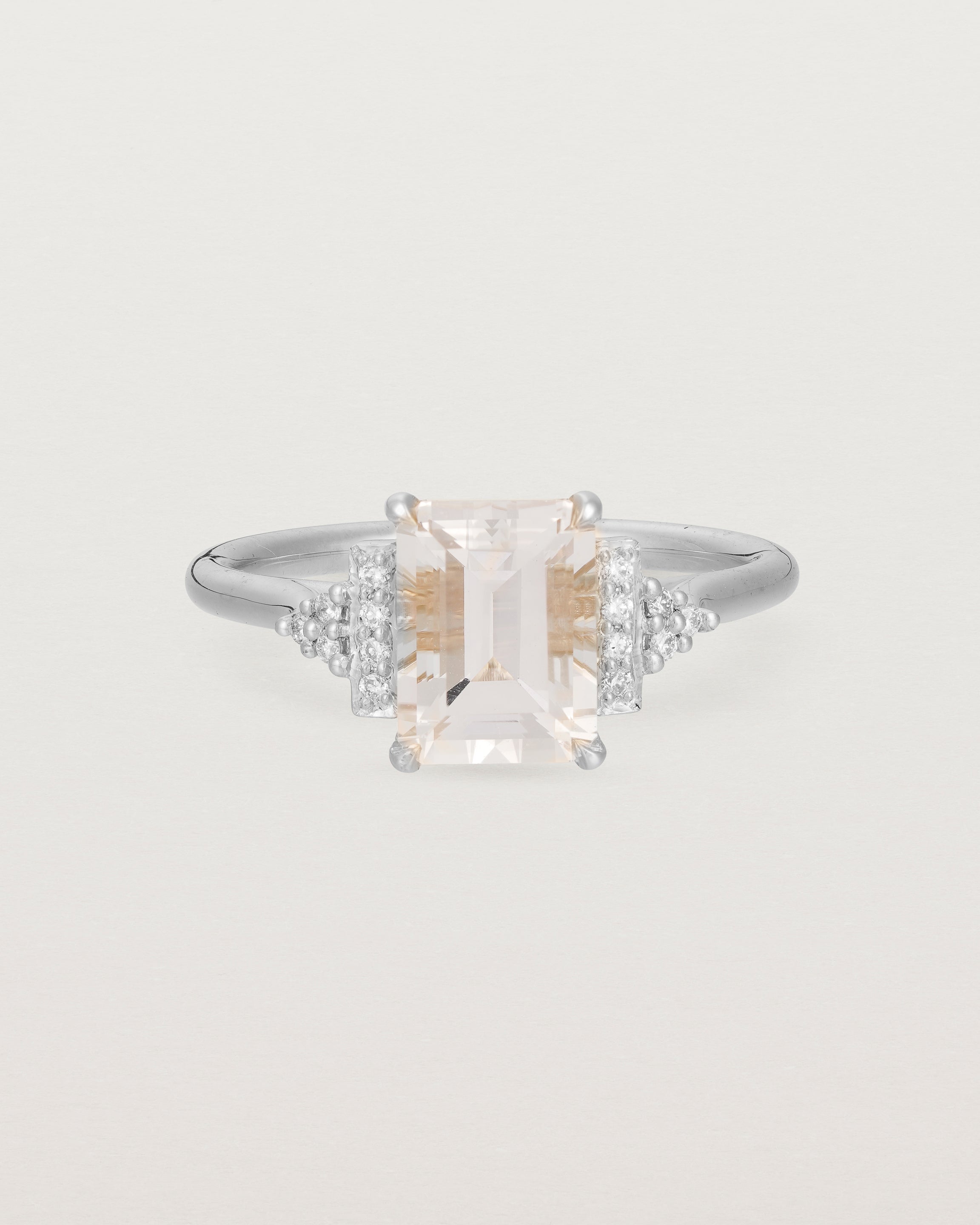 Front view of the Elodie Ring featuring a pale pink emerald cut morganite in white gold