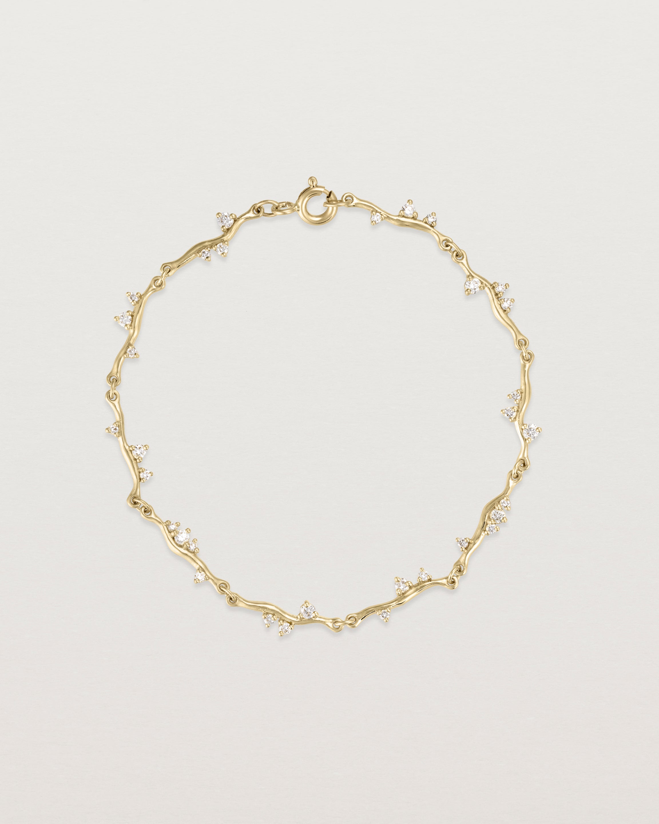top view of diamond ember bracelet in yellow gold