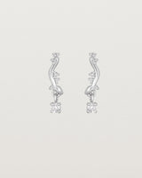 front image of diamond drop ember earrings in white gold.