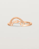 Fit two of a double arc crown ring with white diamonds adoring the inner arc - crafted in rose gold.