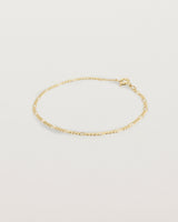 Our signature figaro chain in yellow gold