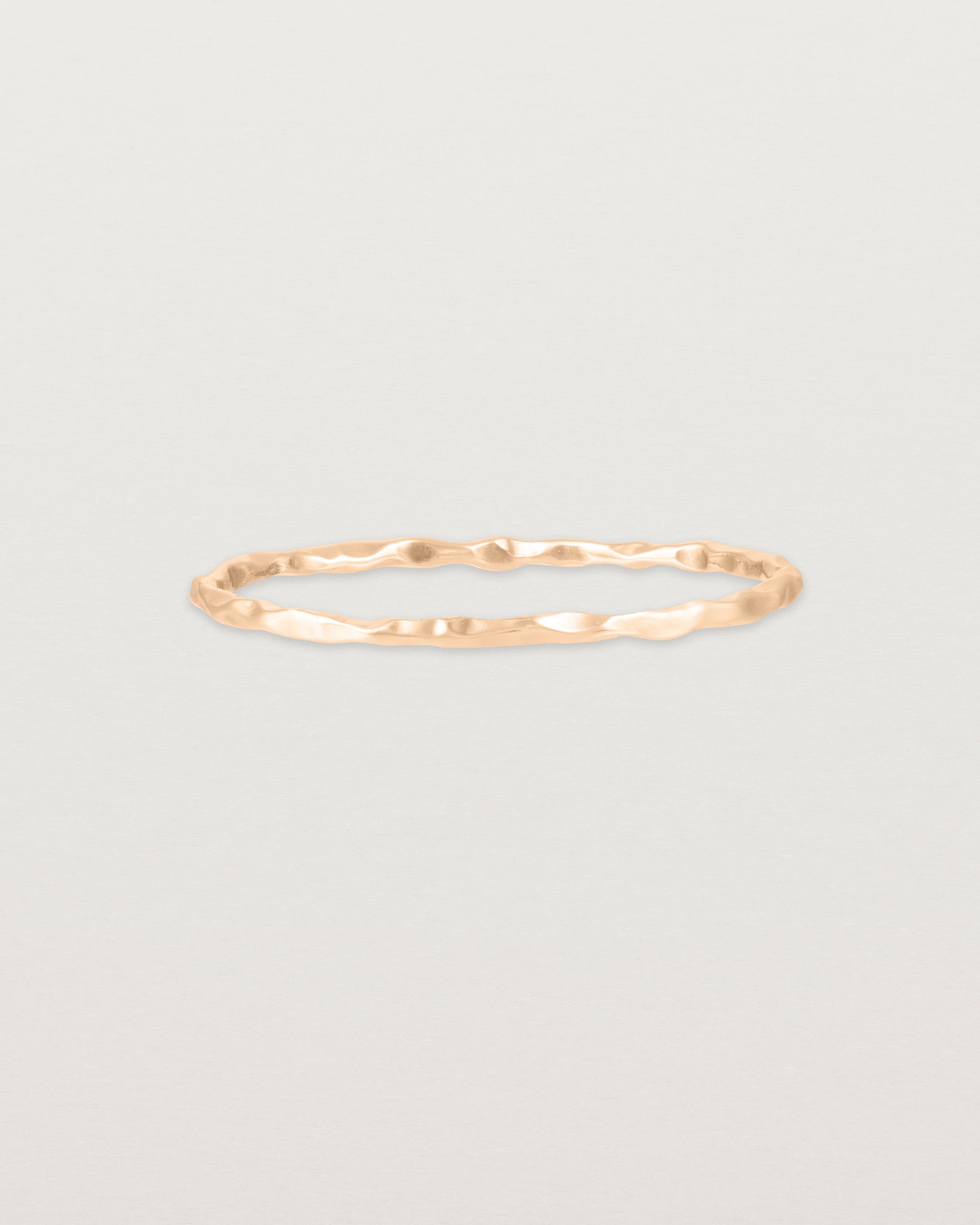 Front view of the Fine Faceted Stacking Ring | Rose Gold.