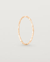 Standing view of the Fine Faceted Stacking Ring | Rose Gold.