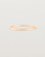 Front view of the Fine Stacking Ring in rose gold.