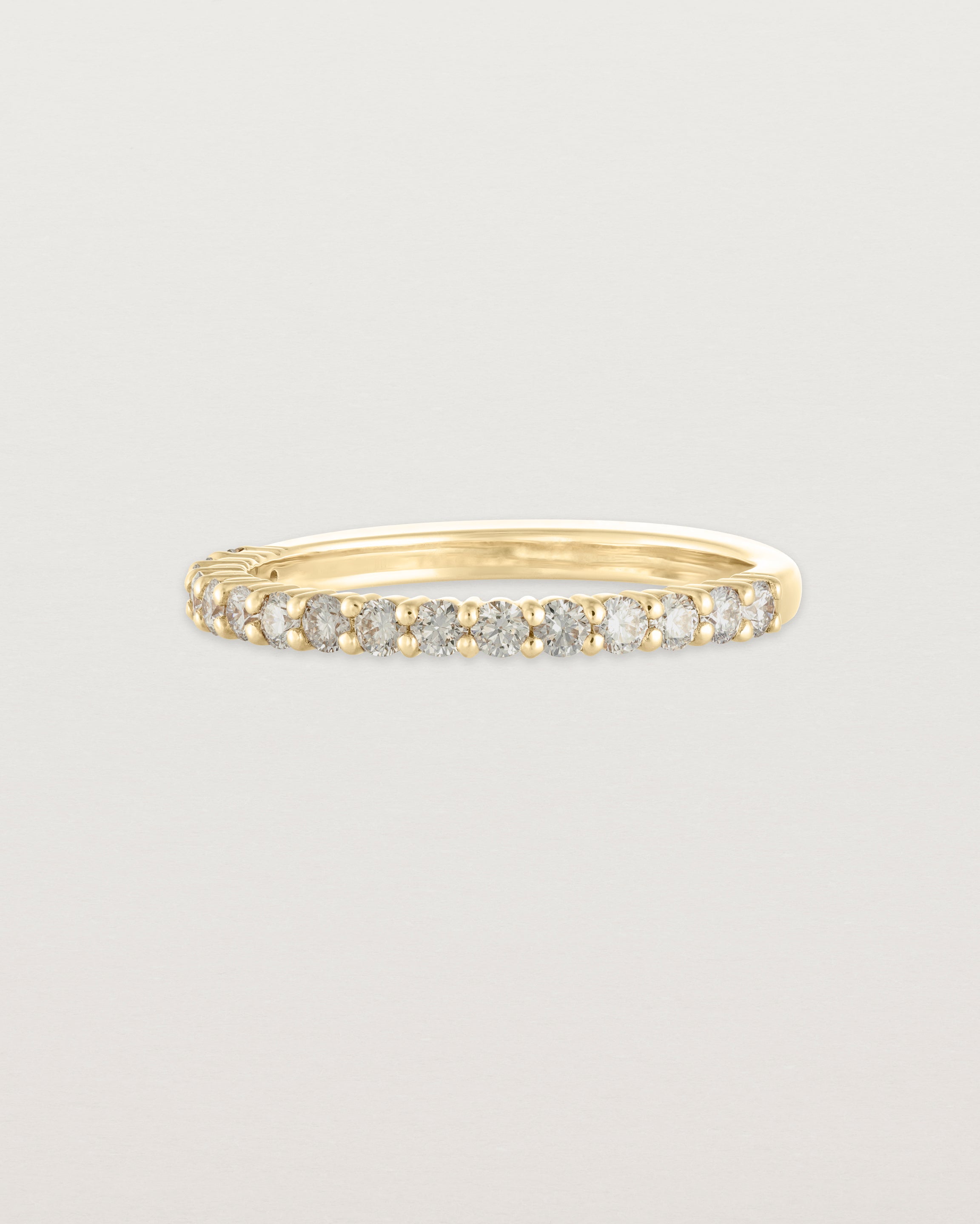 Angled view of the Demi Grace Ring | Champagne Diamonds in yellow gold.
