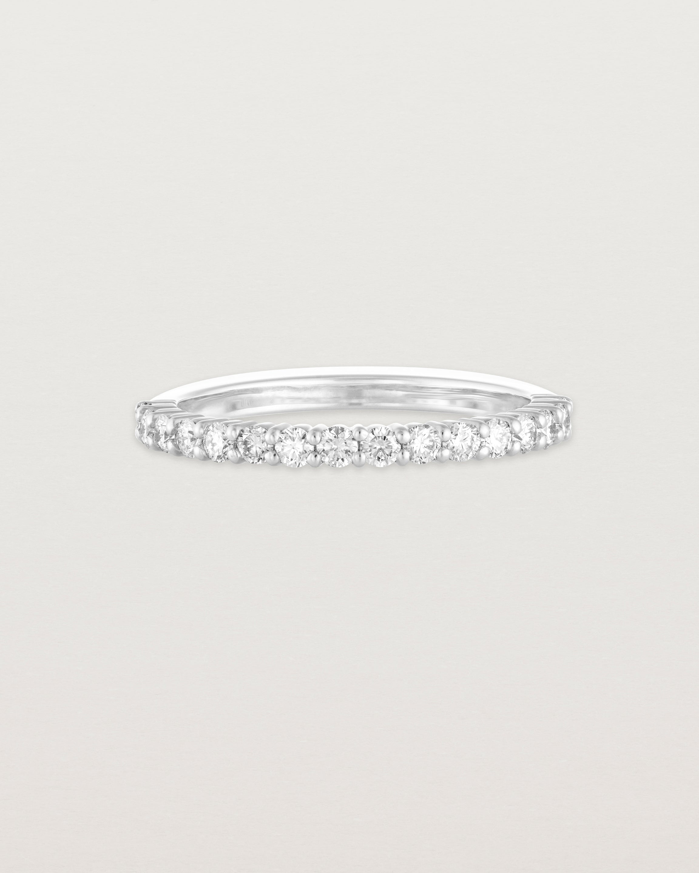 Angled view of the Demi Grace Ring | White Diamonds in white gold.