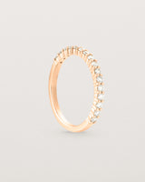 Standing view of the Demi Grace Ring | White Diamonds in rose gold.