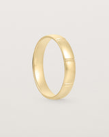 Standing view of the Grain Wedding Ring | 4mm | Yellow Gold.