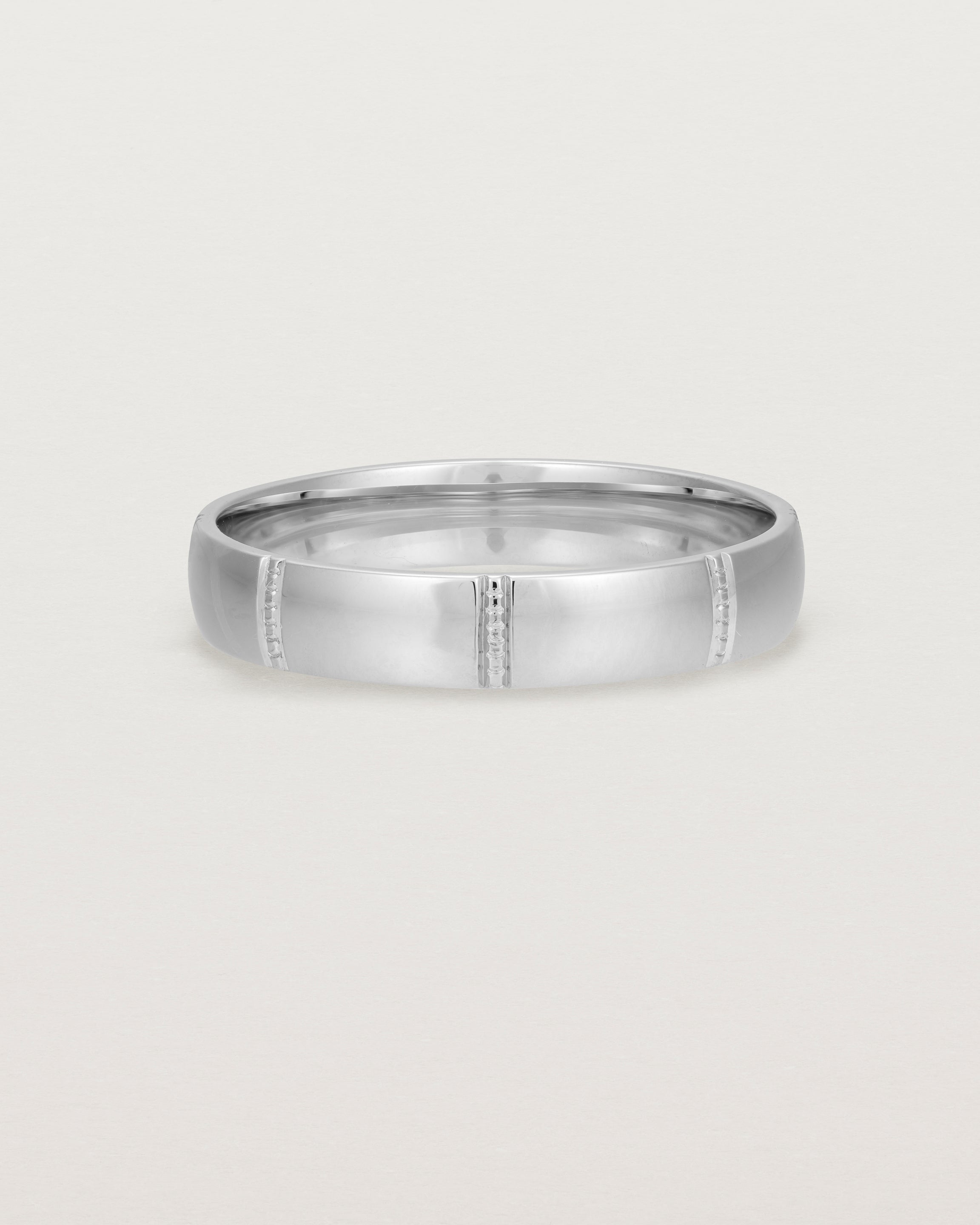 Front view of the Grain Wedding Ring | 4mm | White Gold.