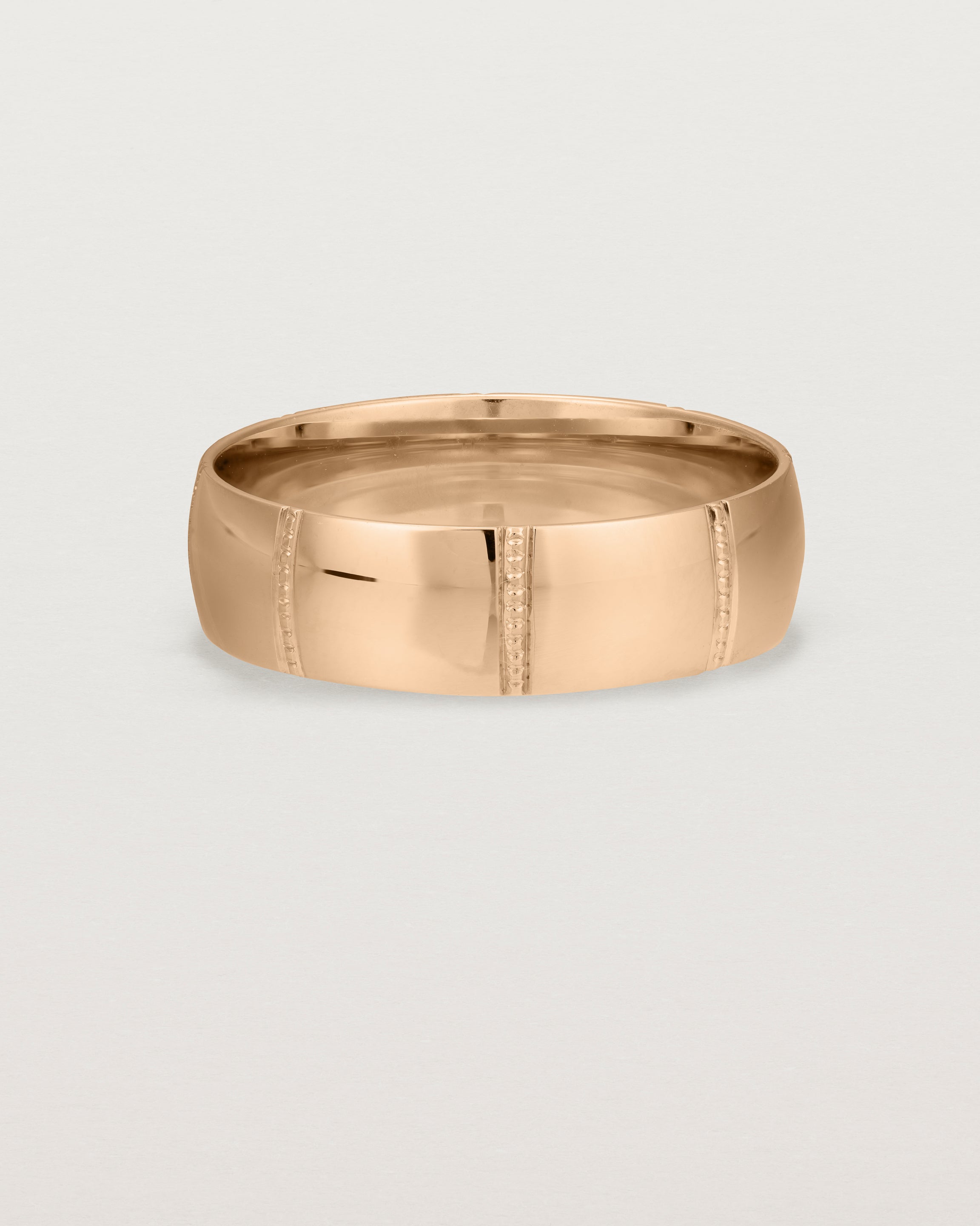 Front view of the Grain Wedding Ring | 6mm | Rose Gold.