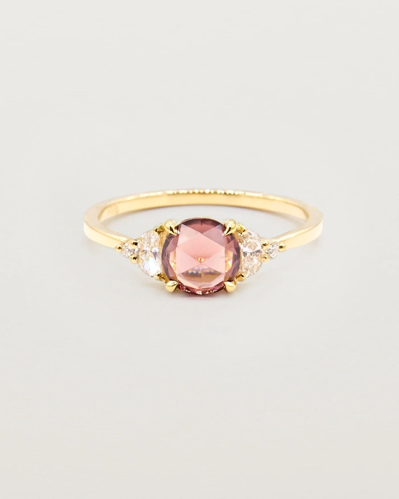 Peach Zircon engagement ring in yellow gold