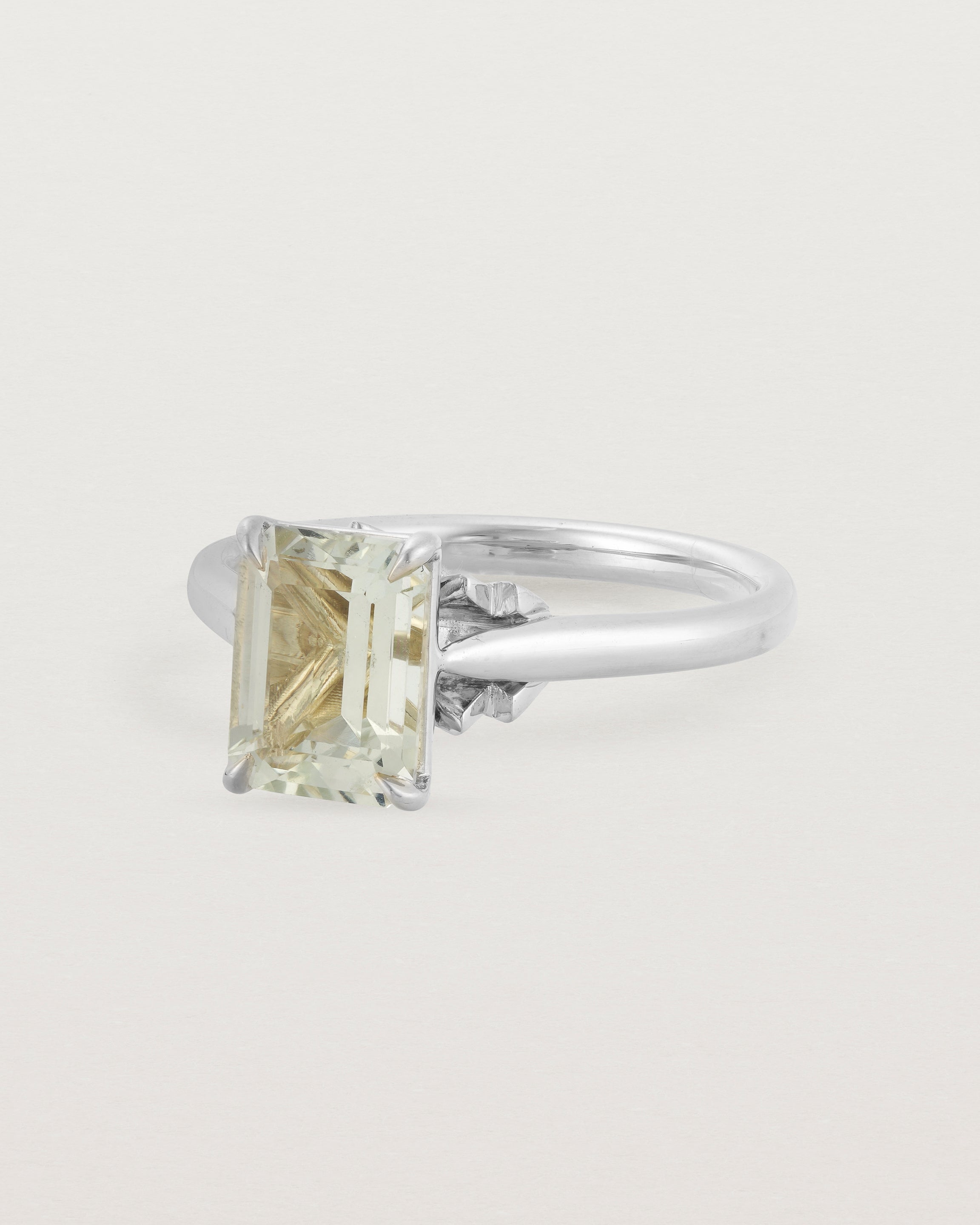 Angled view of the Front view of the Kalina Emerald Solitaire | Green Amethyst | White Gold.