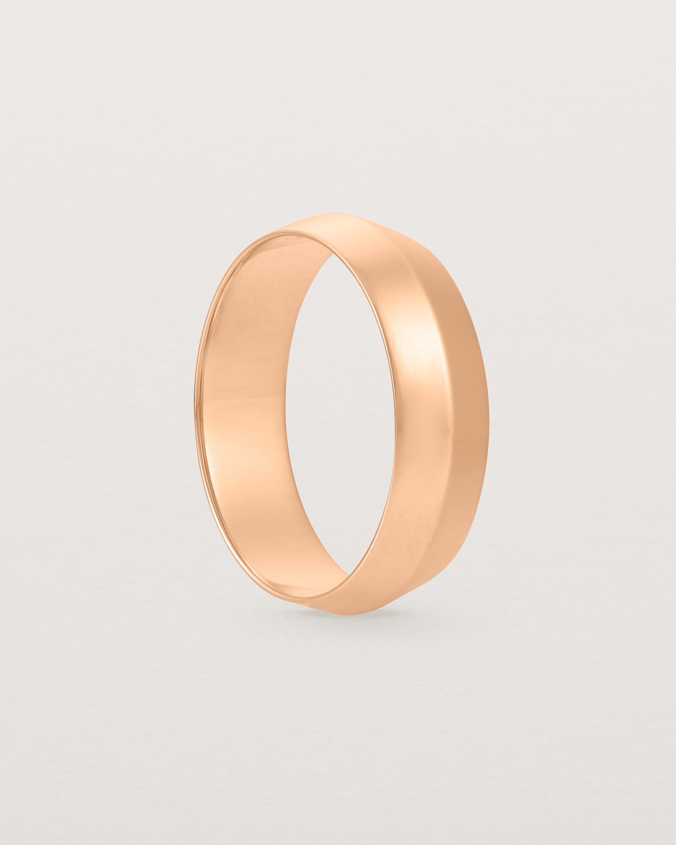 Standing view of the Knife Edge Wedding Ring | 6mm | Rose Gold.