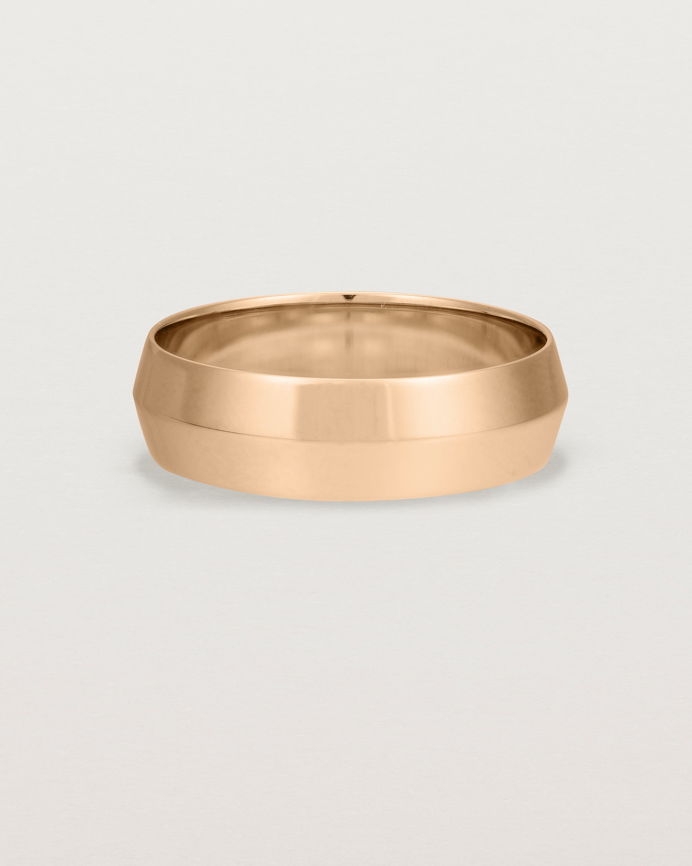 Front view of the Knife Edge Wedding Ring | 6mm | Rose Gold.Front view of the Knife Edge Wedding Ring | 6mm | Rose Gold.