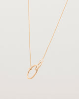 two circles interlinking on a rose gold necklace