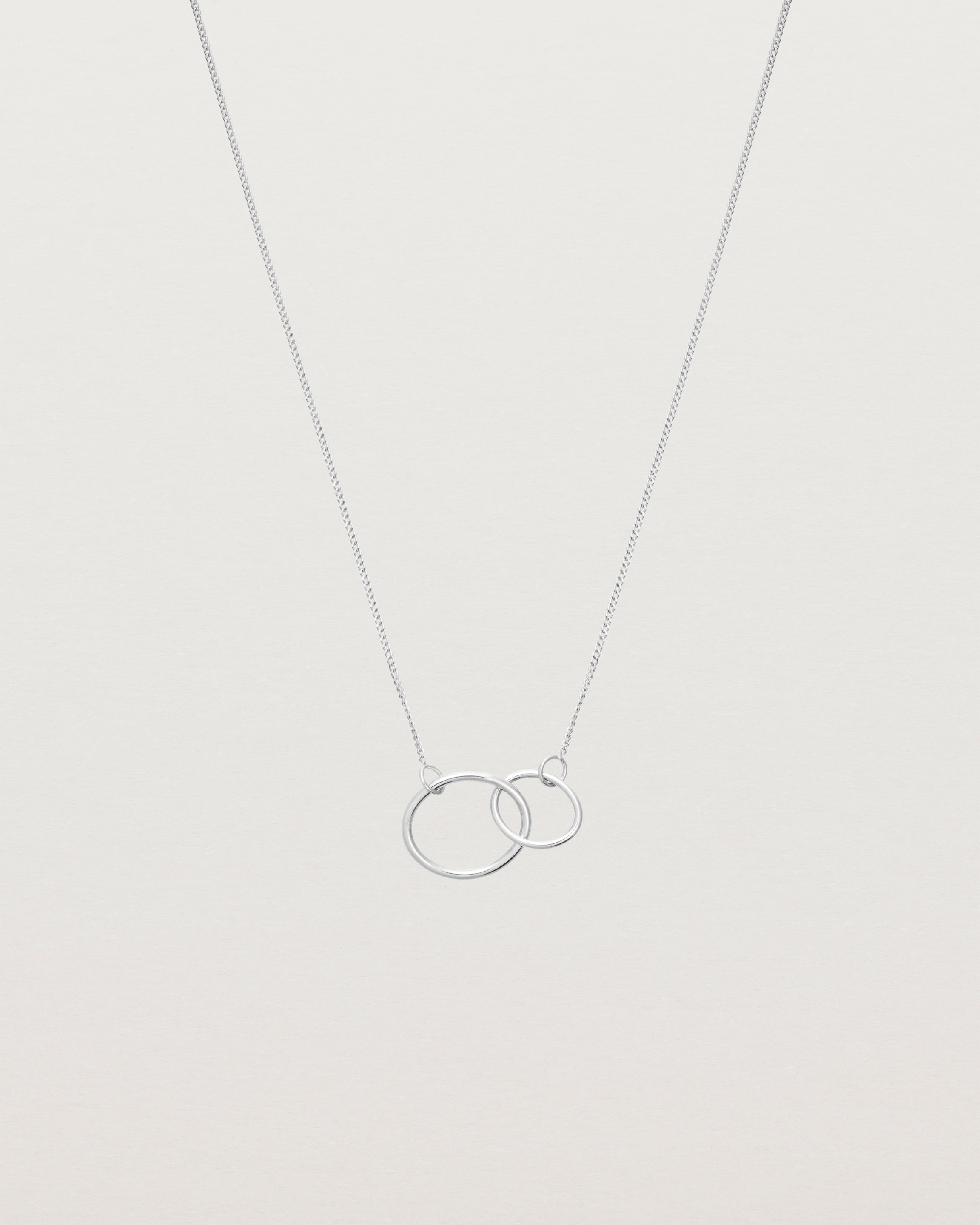 two circles interlinking on a white gold necklace