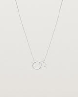 two circles interlinking on a white gold necklace